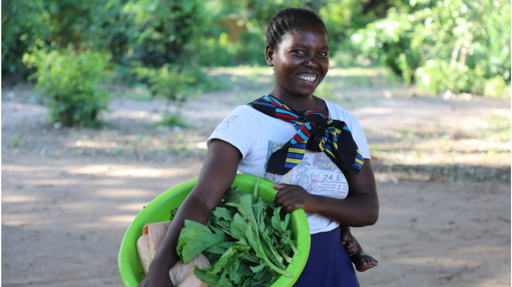 Margaret has learnt gardening skills from the safe space, which she is using to grow different crops for selling ©UNFPA/Joseph Scott