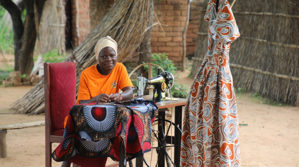 Sakina is using her tailoring skills to generate an income enabling her to meet her daily needs ©UNFPA/Joseph Scott/2025