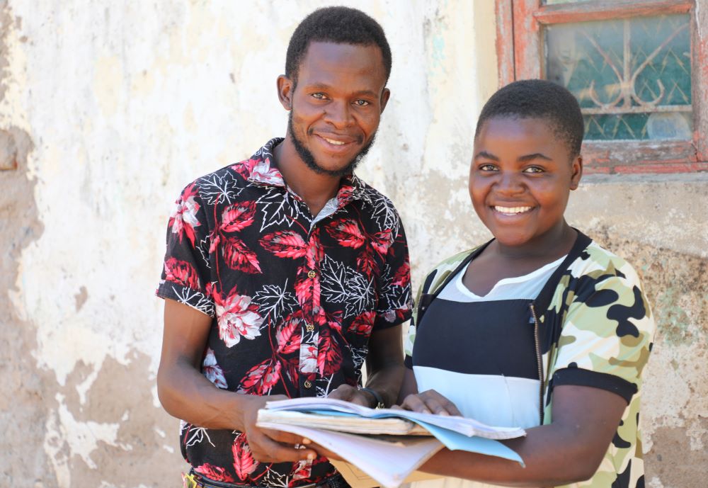 Odala visiting Agnes to check on her progress in school