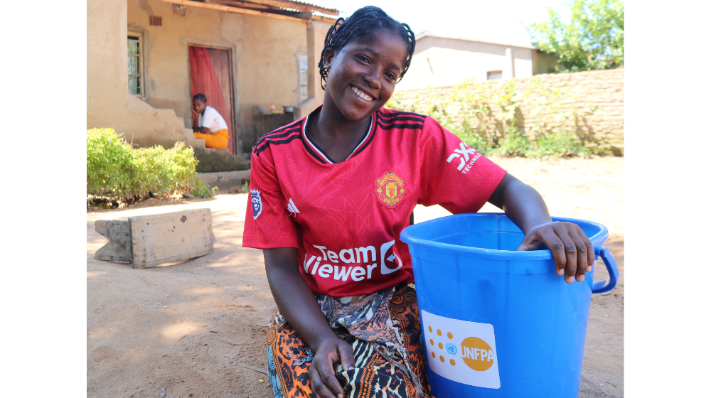 Atupele is still using some of the items from the dignity kit five months after the disaster ©UNFPA/Malawi/2024