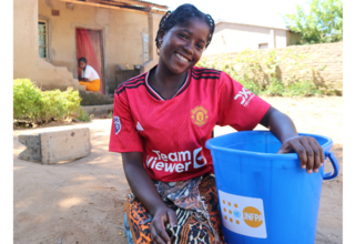 Atupele is still using some of the items from the dignity kit five months after the disaster ©UNFPA/Malawi/2024