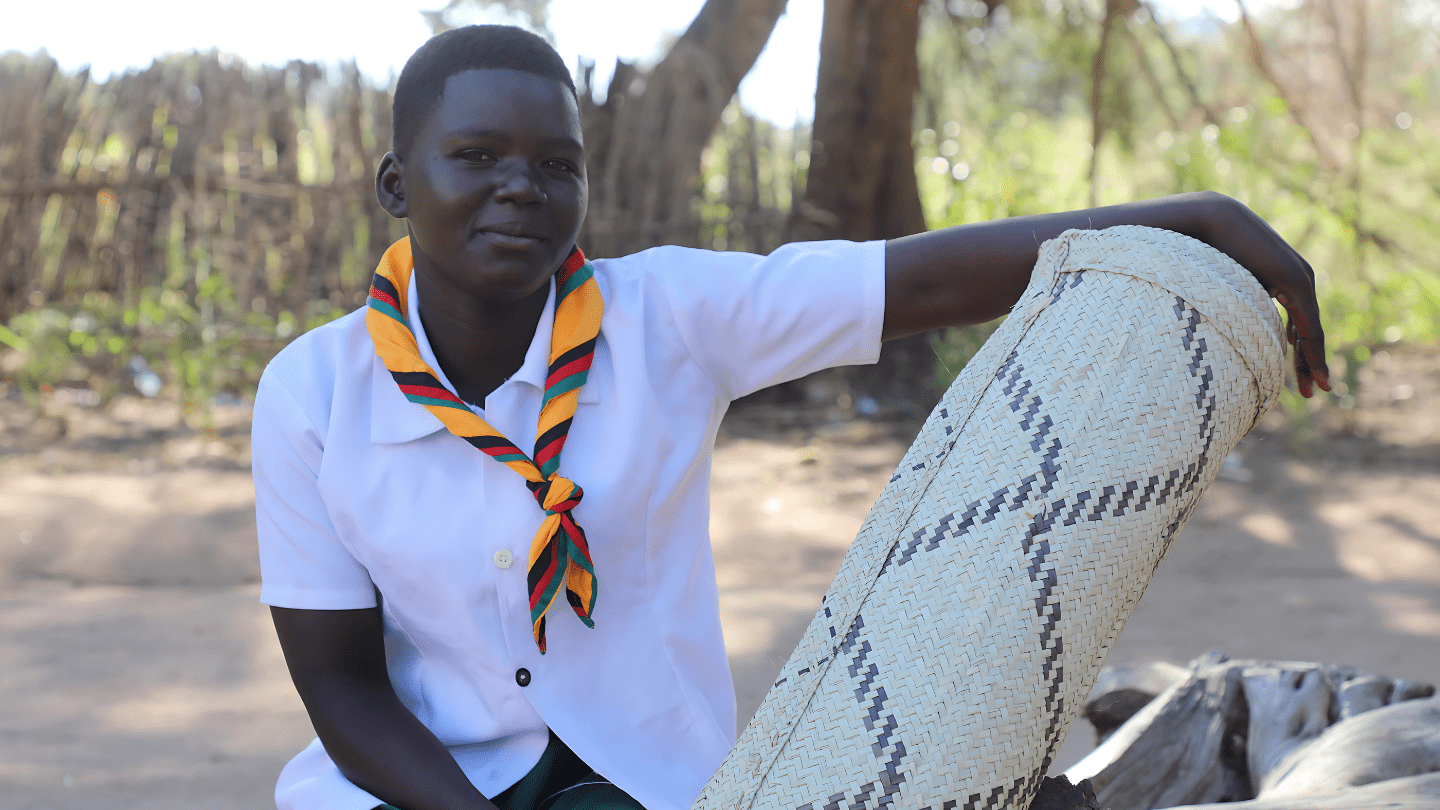 Eliza is now back to school. She has also learnt weaving  and use the income to buy basic commodities to support her education ©UNFPA/Joseph Scott